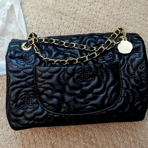 Camellia patterned black crossbody bag